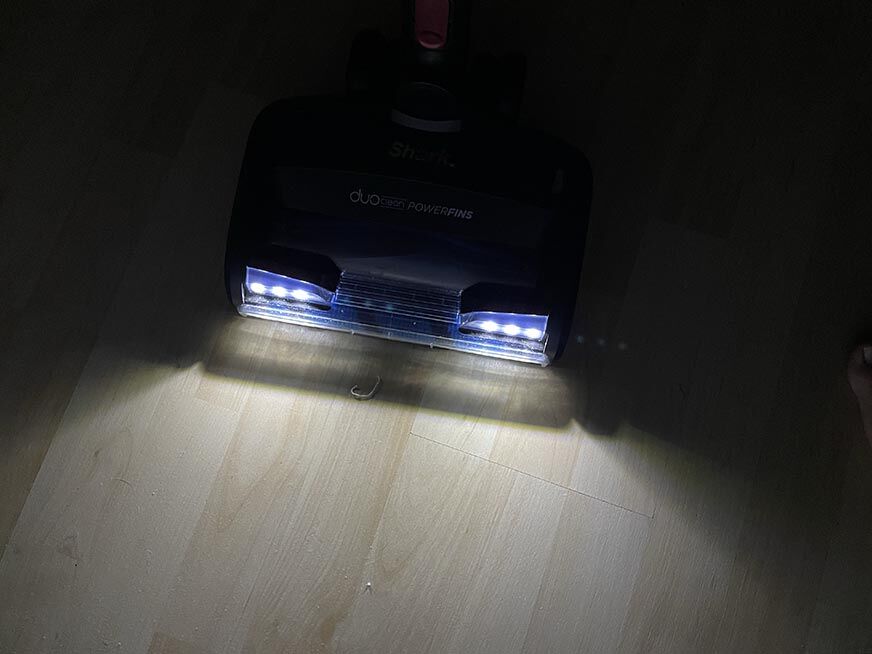 You can see the Shark Anti Hair Wrap Flexology with its LED lights in the dark.